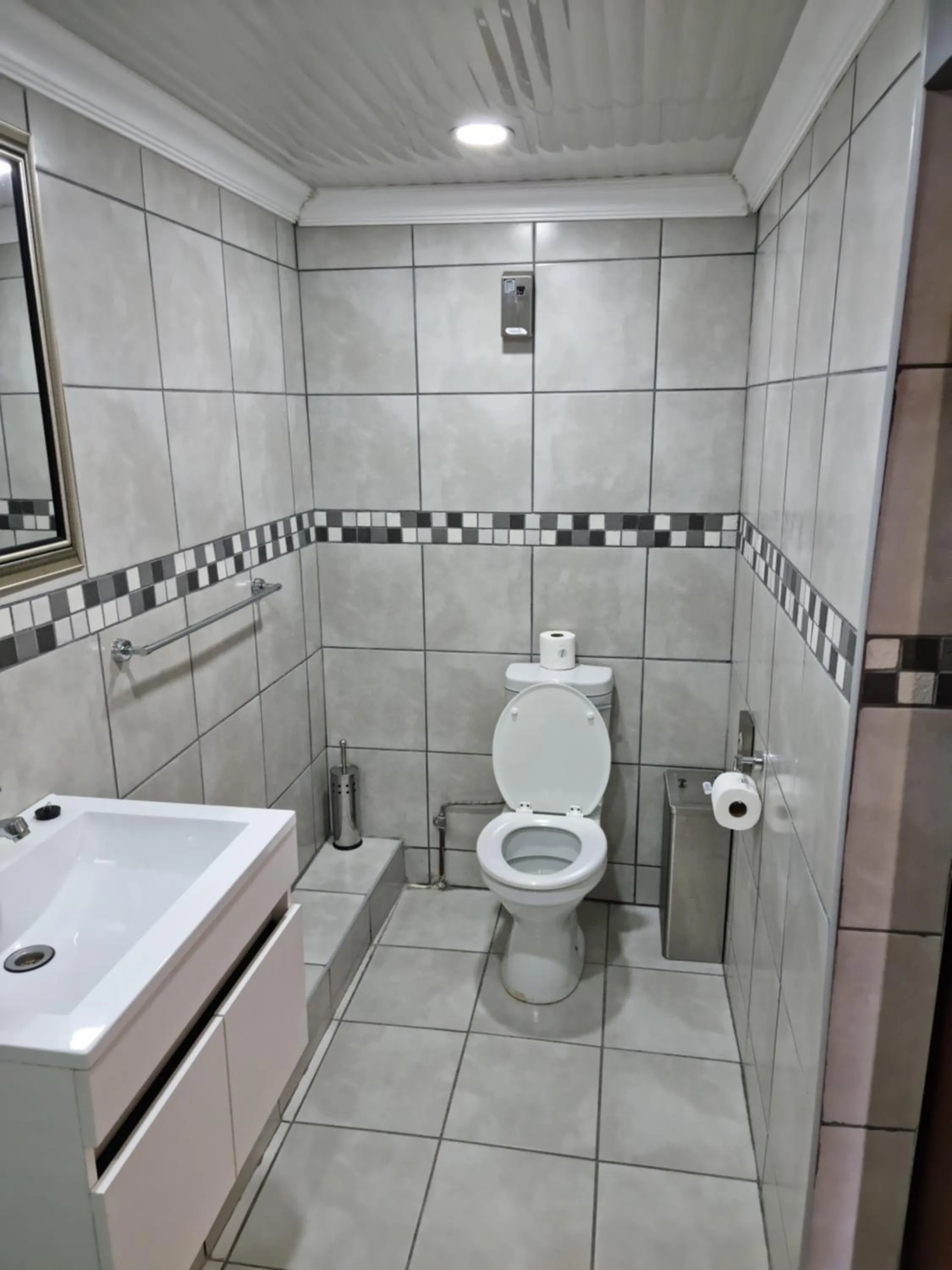 Toilet in Heimat Guesthouse