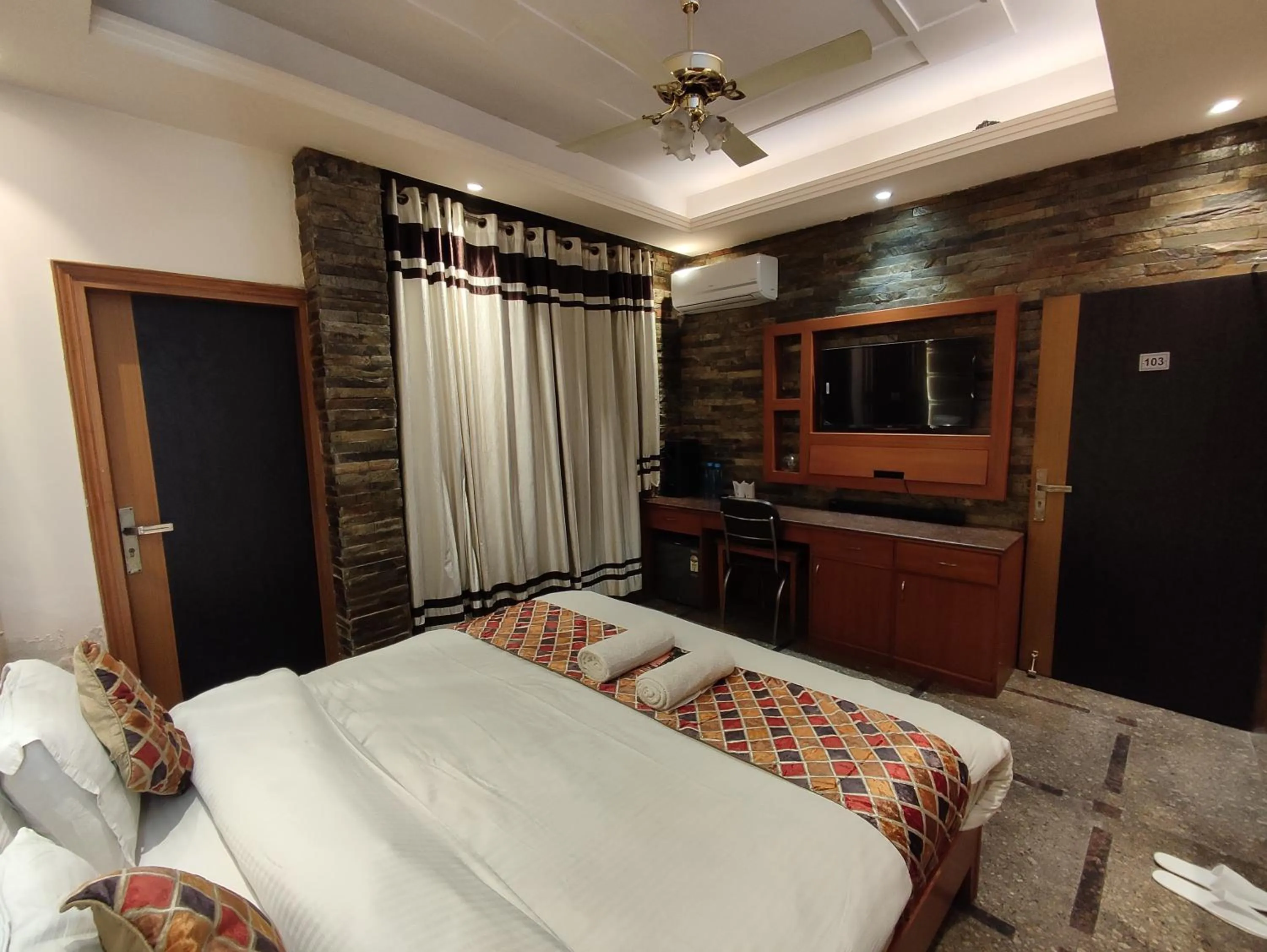 Photo of the whole room, Bed in Stay @ 203