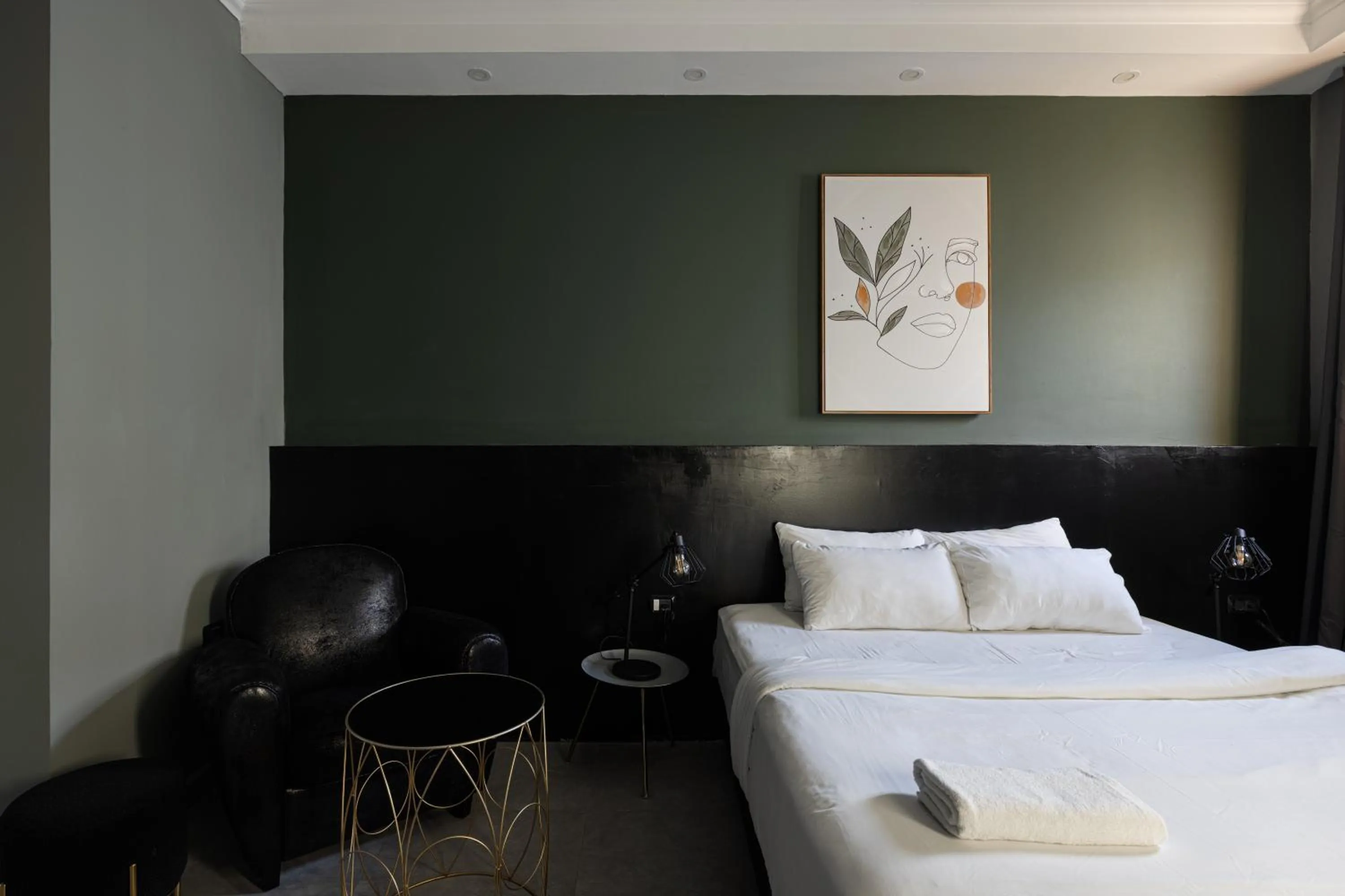 Bed in Residence Suites BY RAPHAEL HOTELS