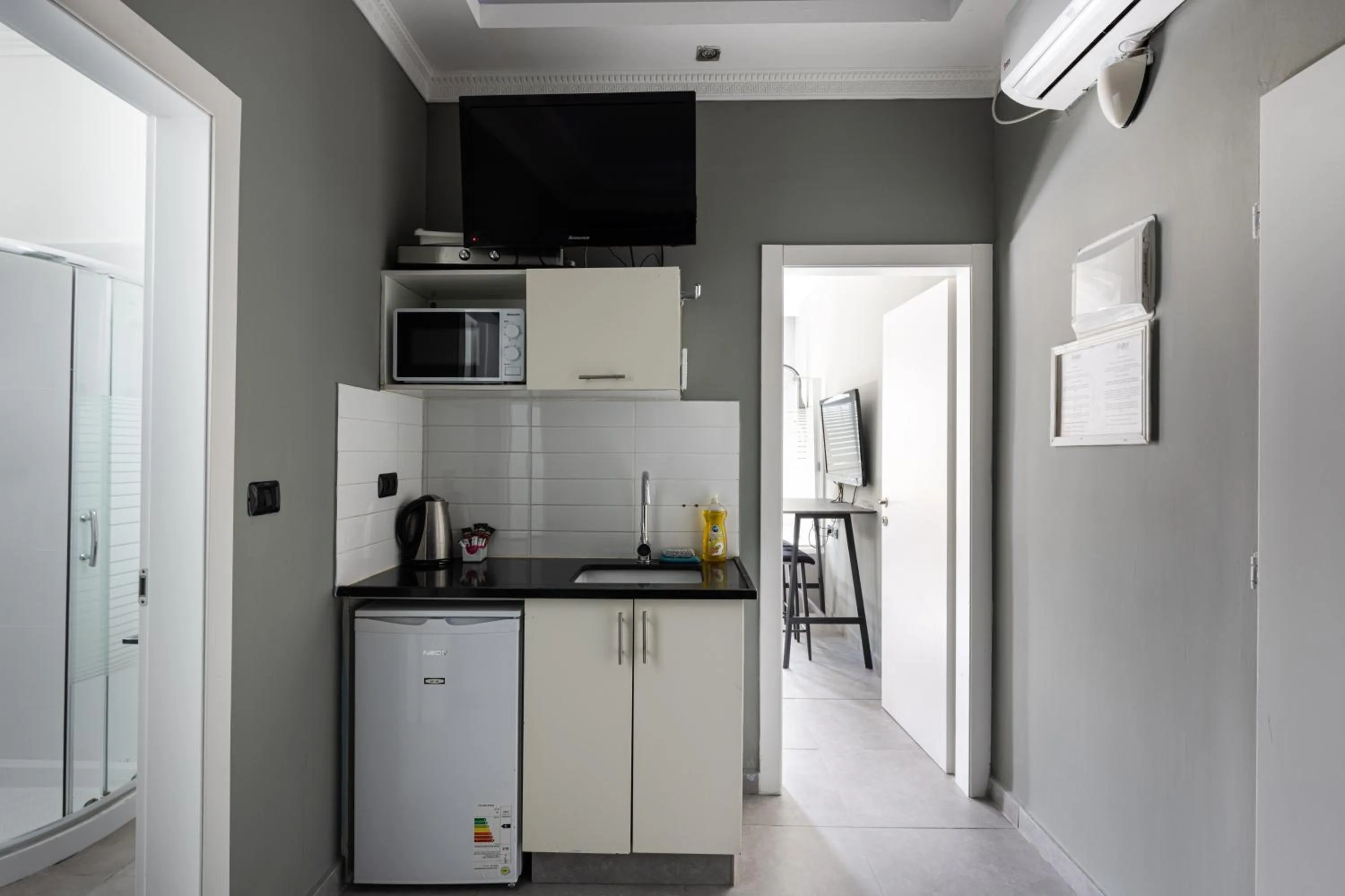 Kitchen or kitchenette in Residence Suites BY RAPHAEL HOTELS