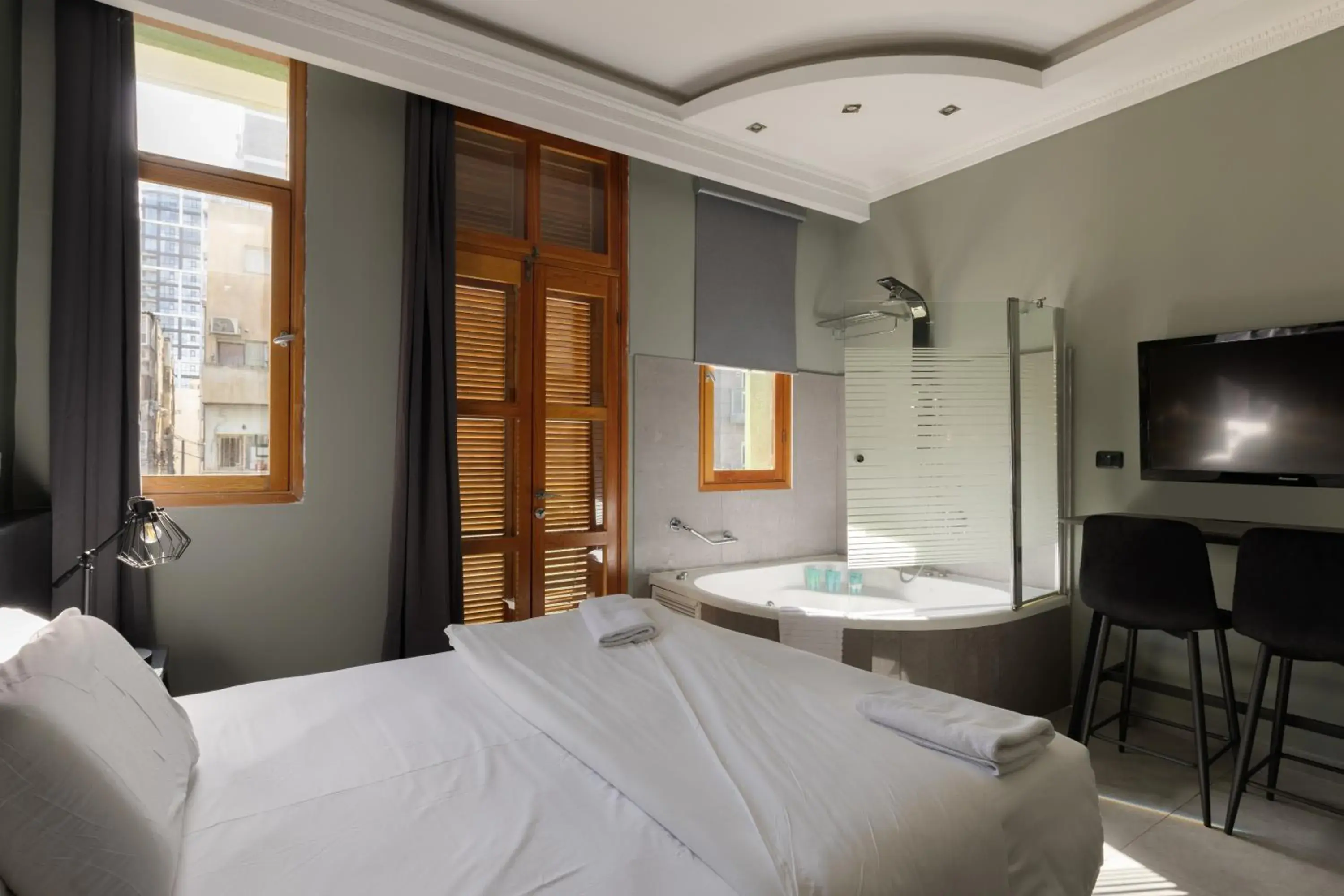 Photo of the whole room, Bed in Residence Suites BY RAPHAEL HOTELS Photo of the whole room, Bed in Residence Suites BY RAPHAEL HOTELS