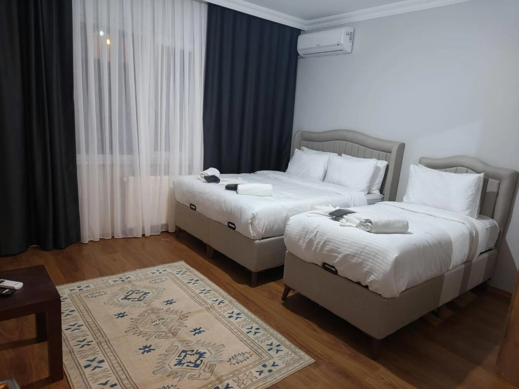 Bed in Royal Garden Suite and Hotel