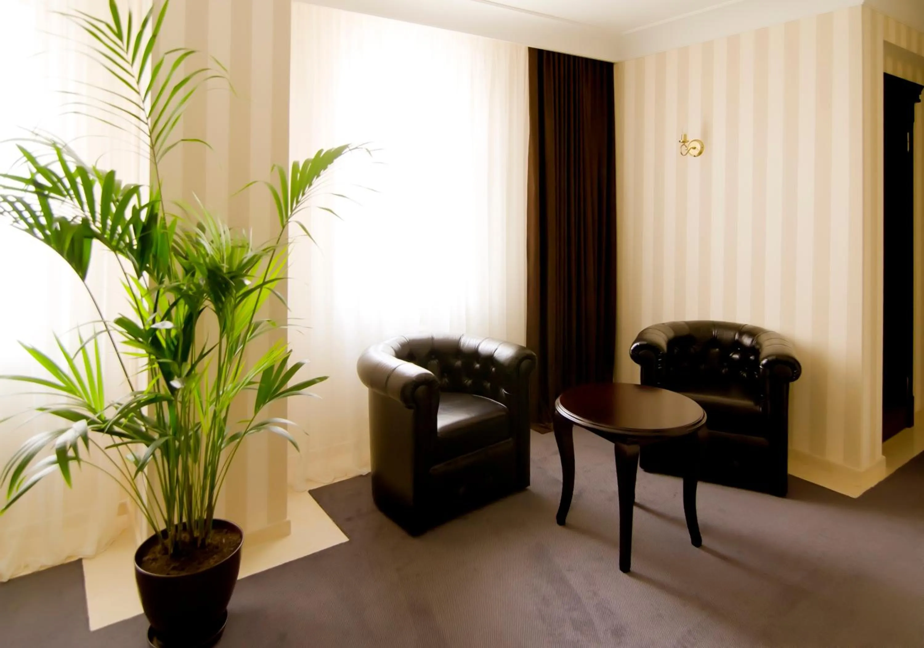 Seating area in Villa Rossa Hotel