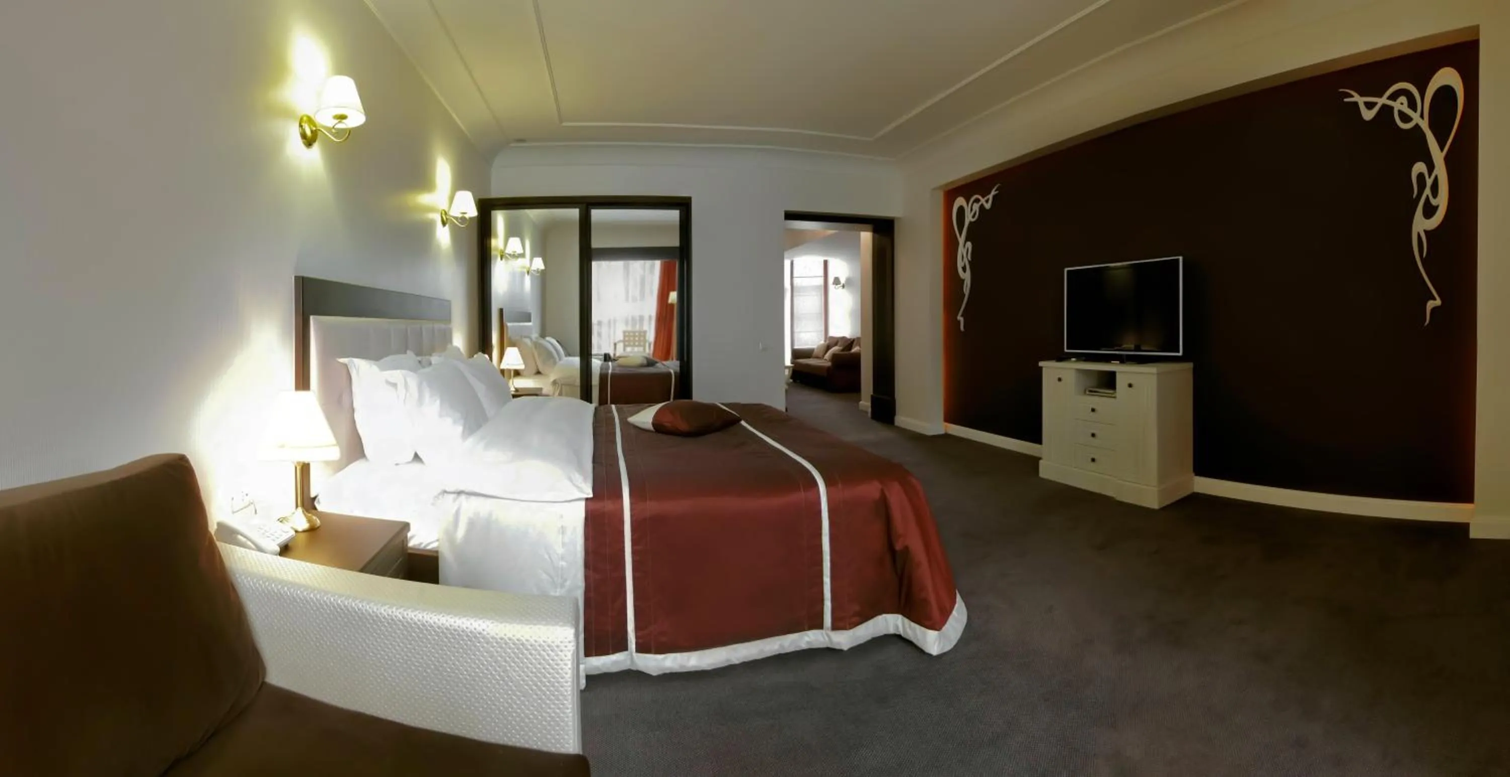 Bed in Villa Rossa Hotel