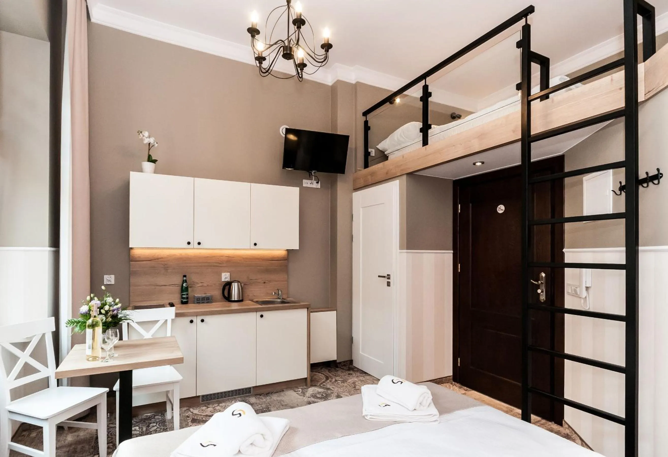 Kitchen or kitchenette, Bed in Apartamenty L5