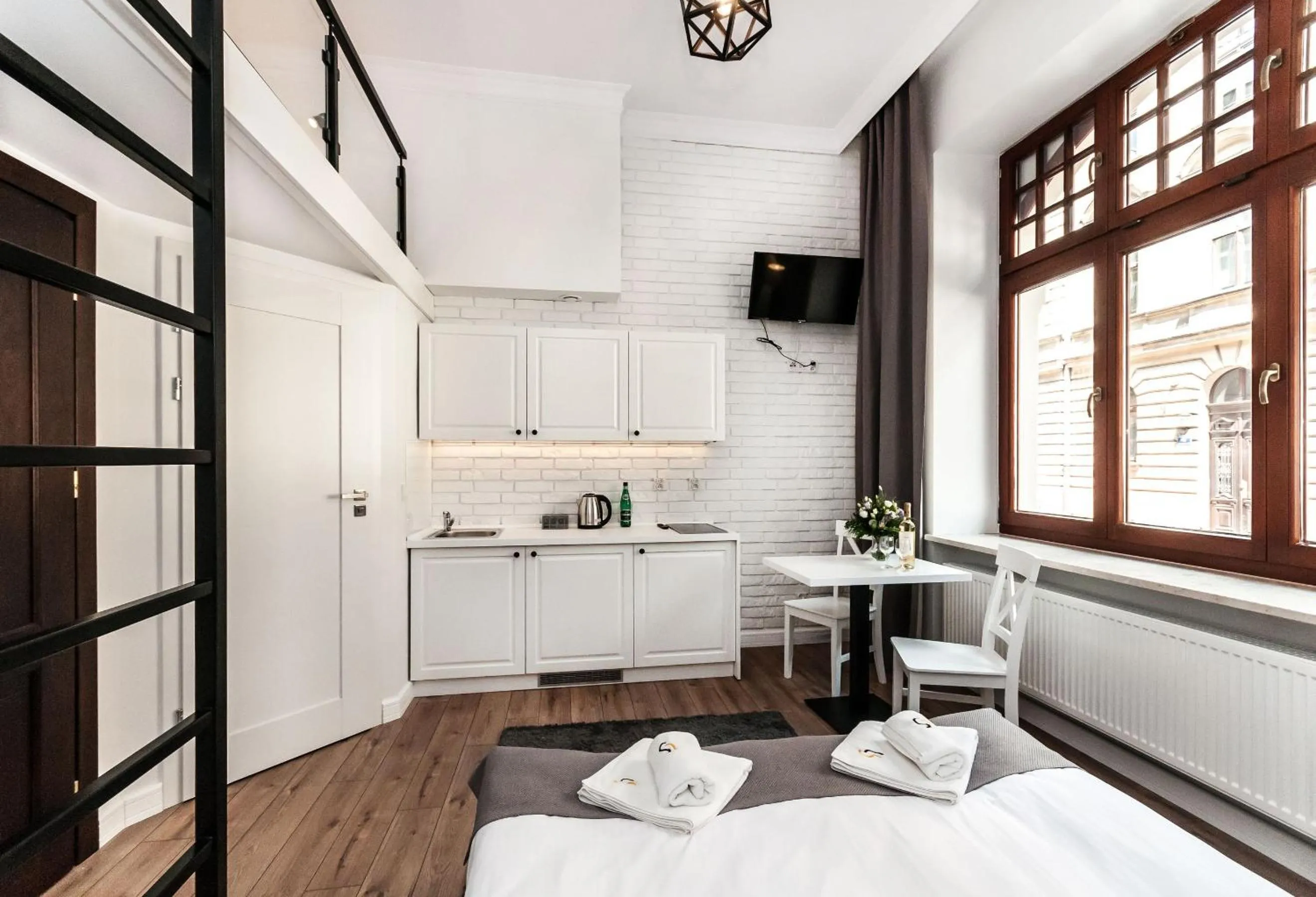 Kitchen or kitchenette, Bed in Apartamenty L5