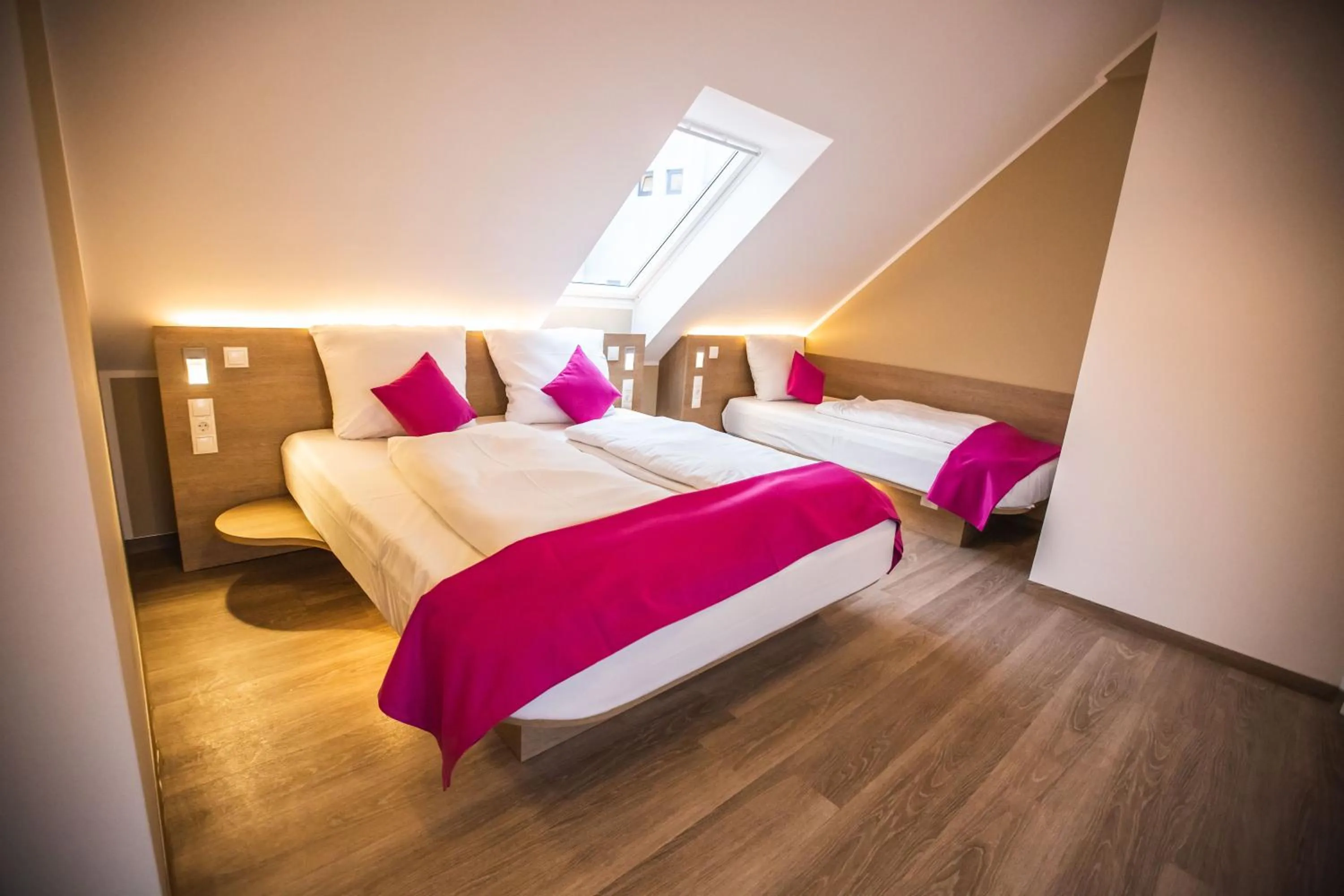 Bed in Hotel Luckys Inn