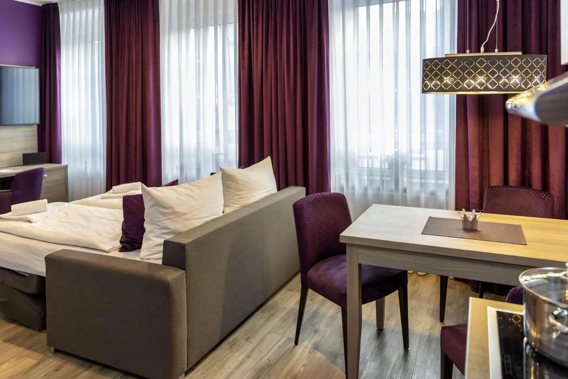 Bed in Apartmenthaus Burgenheimat in Rhens bei Koblenz