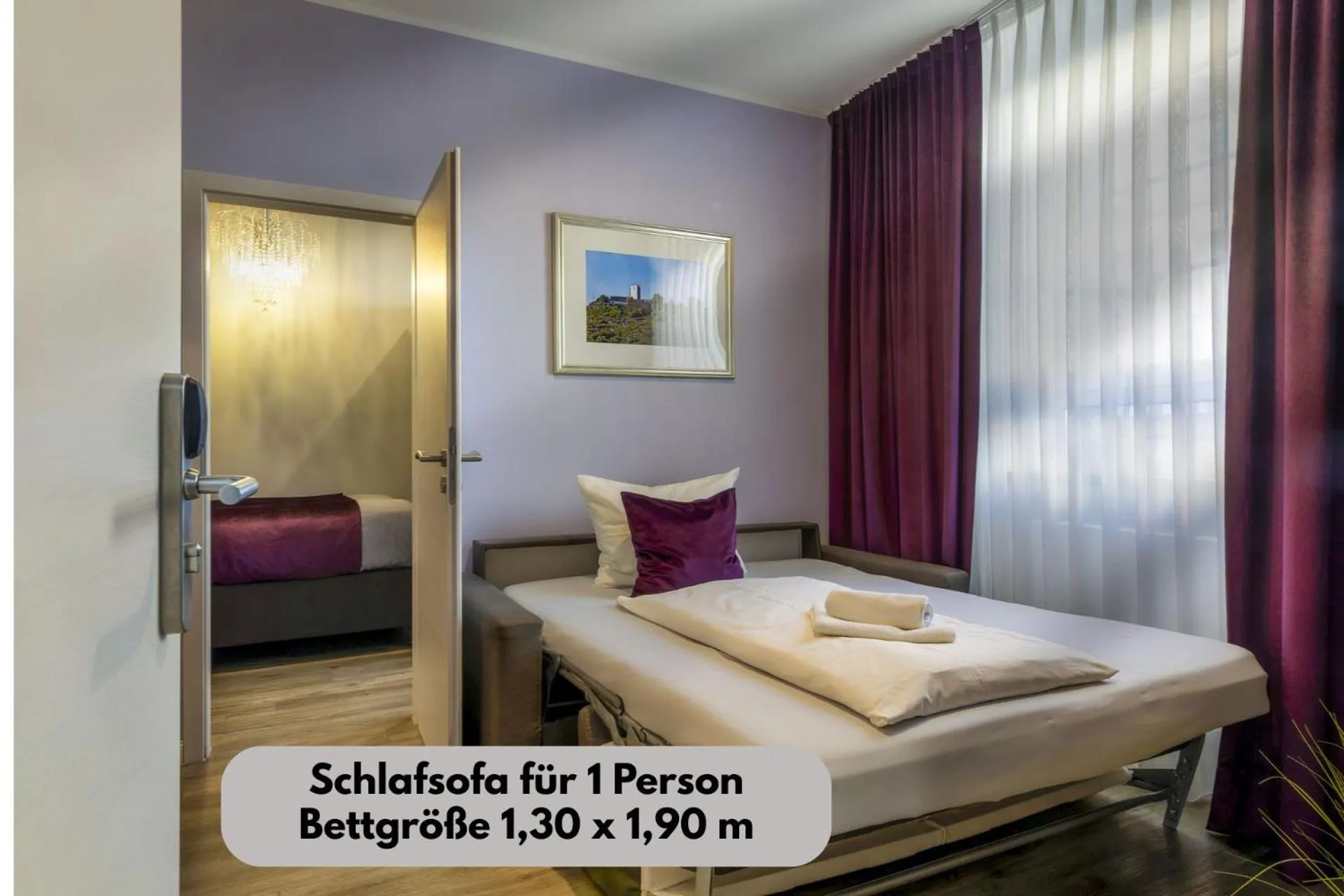 Bed in Apartmenthaus Burgenheimat in Rhens bei Koblenz