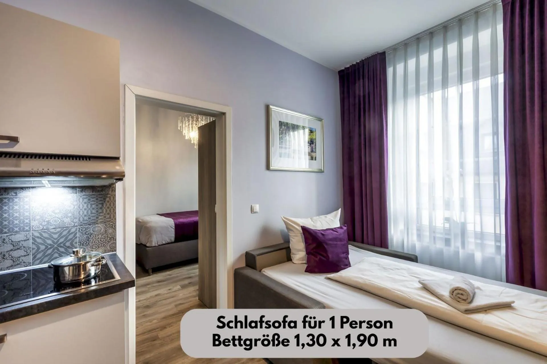 Bed in Apartmenthaus Burgenheimat in Rhens bei Koblenz