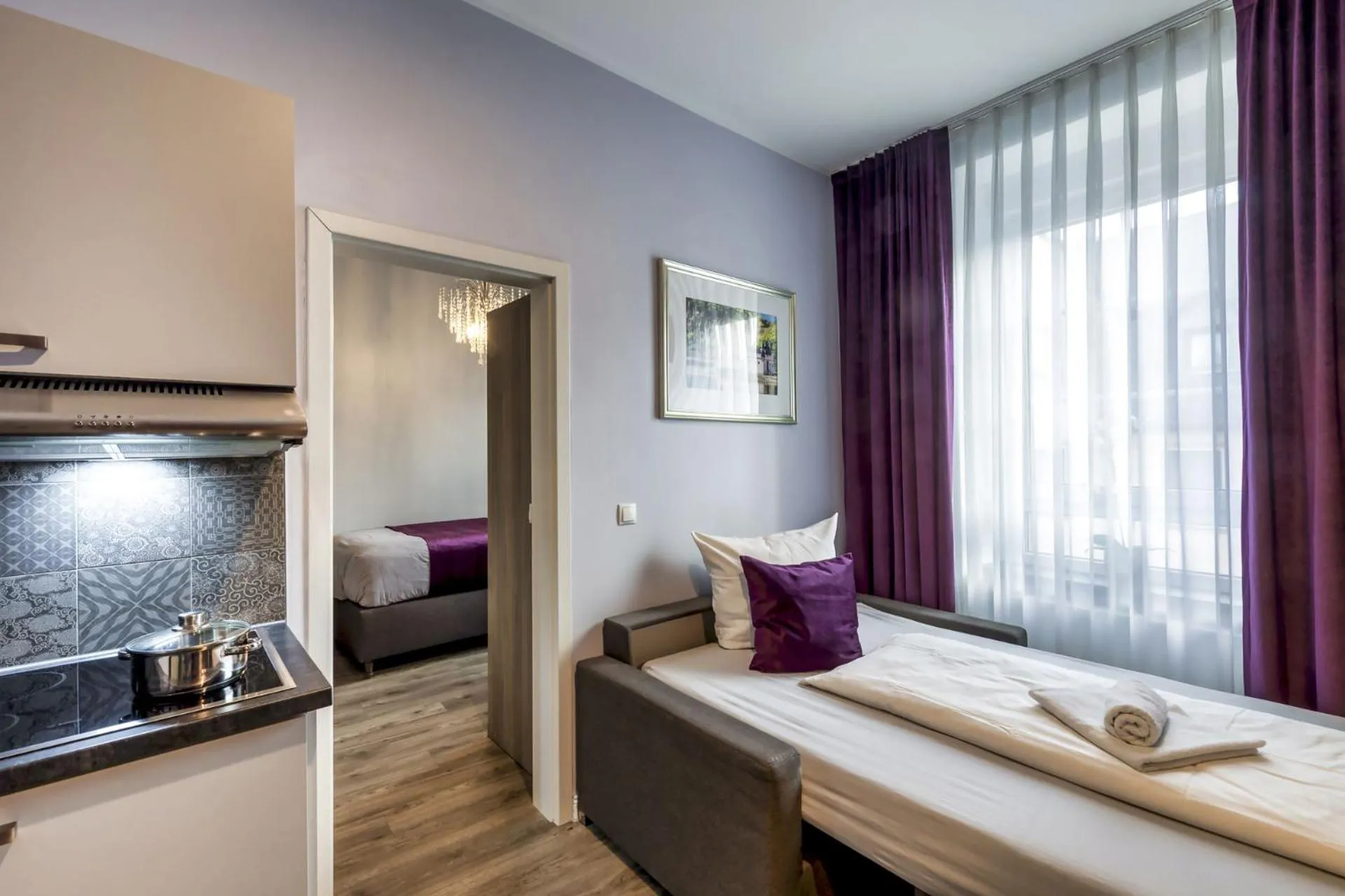 Bed in Apartmenthaus Burgenheimat in Rhens bei Koblenz