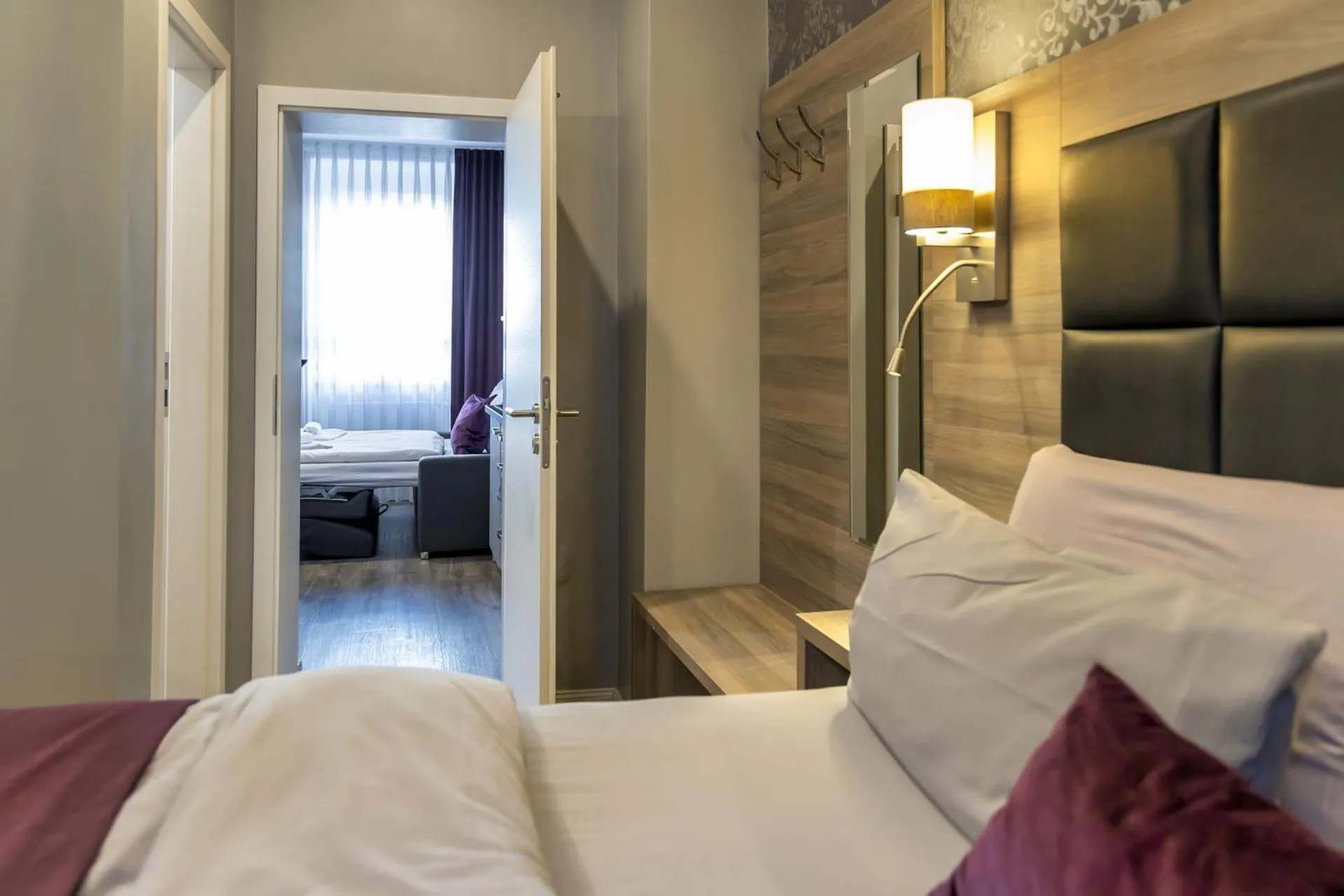 Bed in Apartmenthaus Burgenheimat in Rhens bei Koblenz