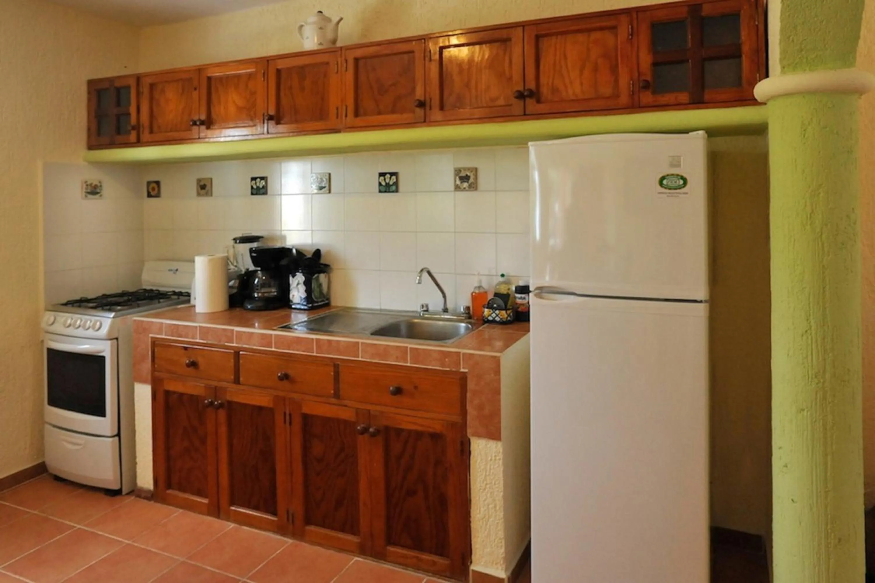 Kitchen or kitchenette in Righetto Vacation Rentals