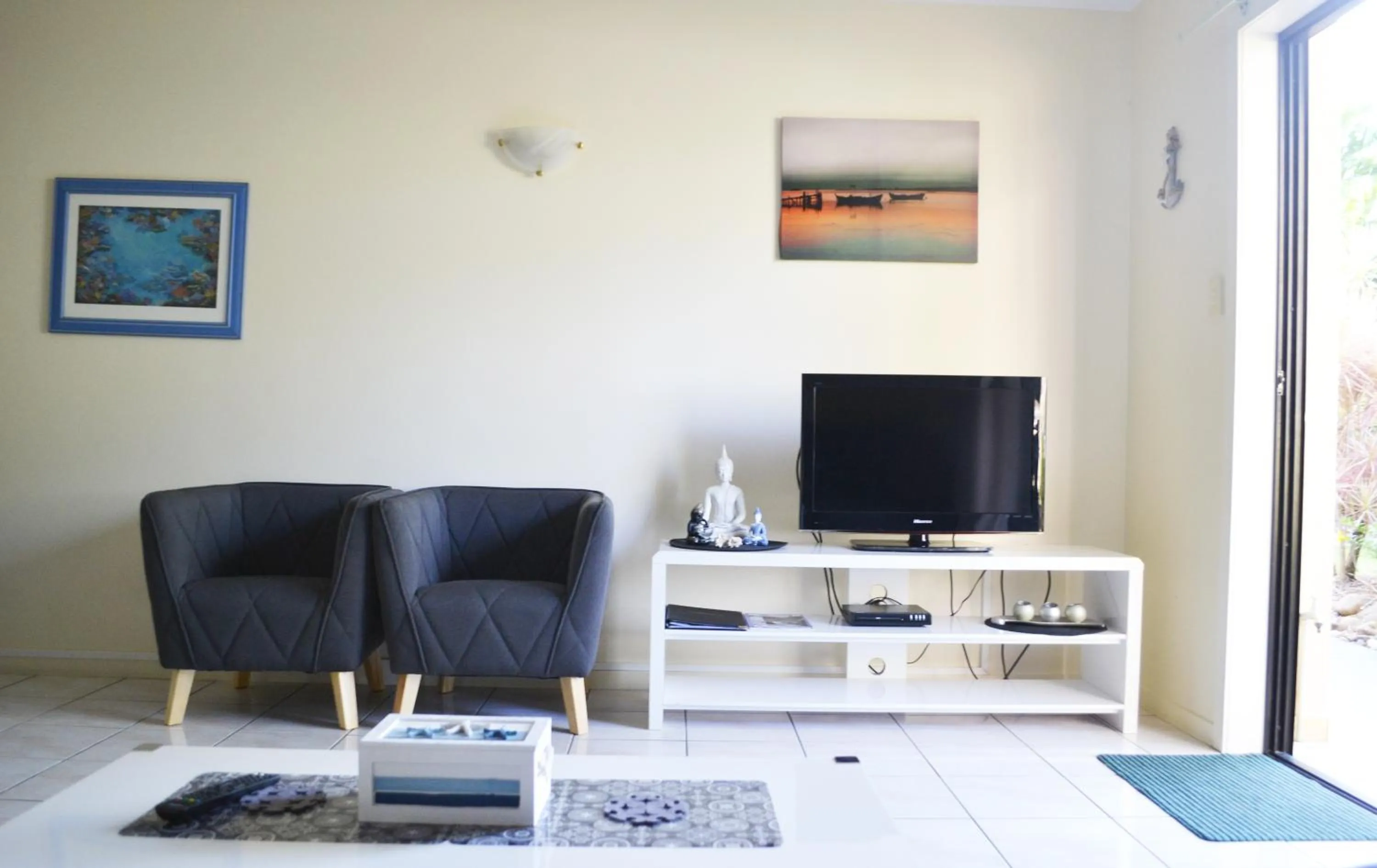 Communal lounge/ TV room in Hinchinbrook Resorts Management Pty Ltd