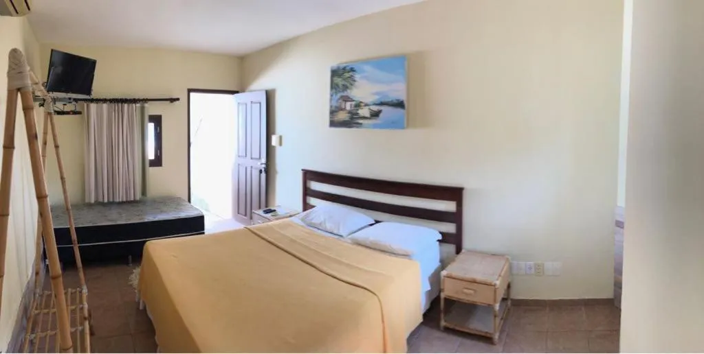 Photo of the whole room, Bed in Pousada Corais do Sul