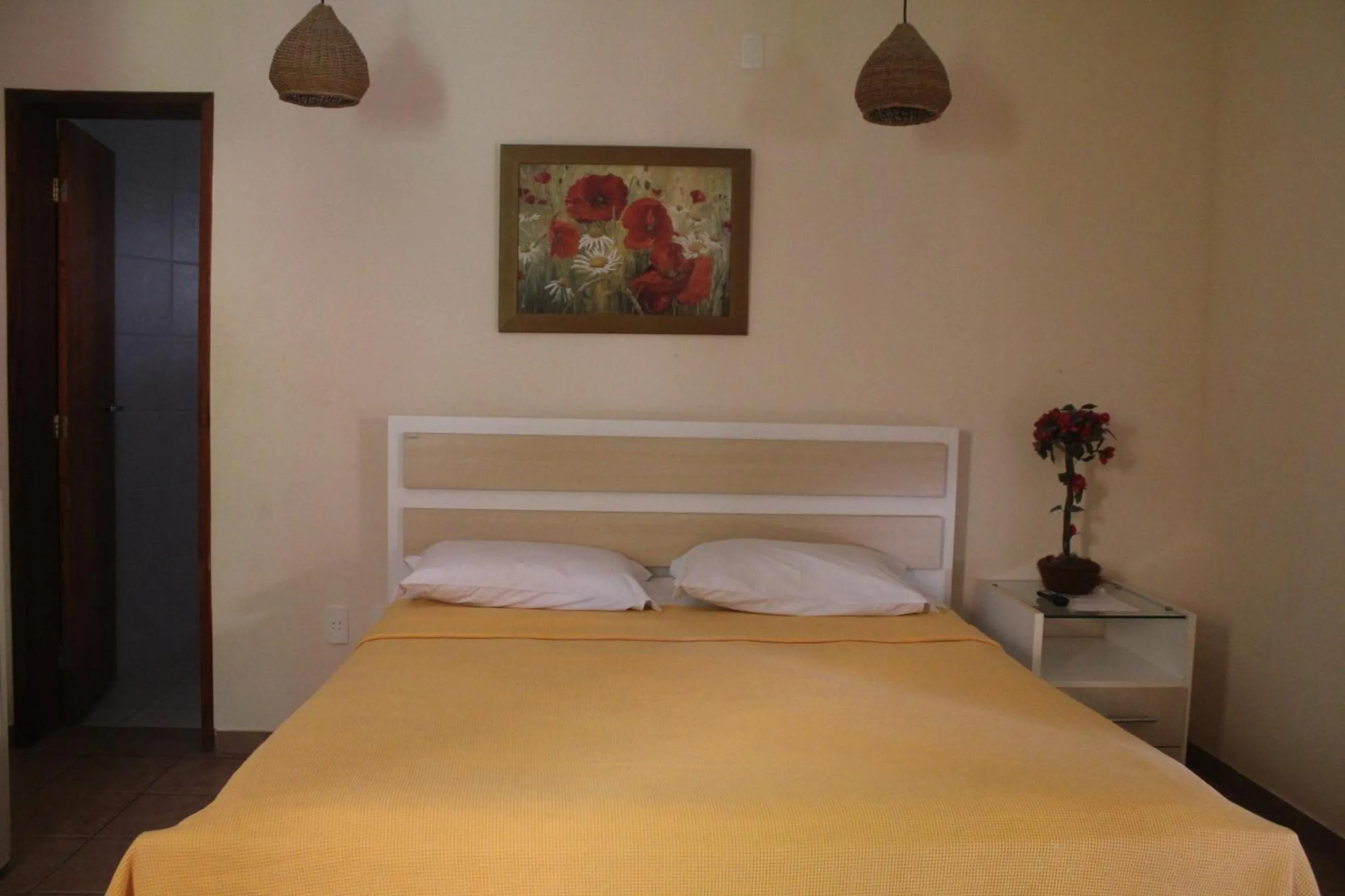 Photo of the whole room, Bed in Pousada Corais do Sul