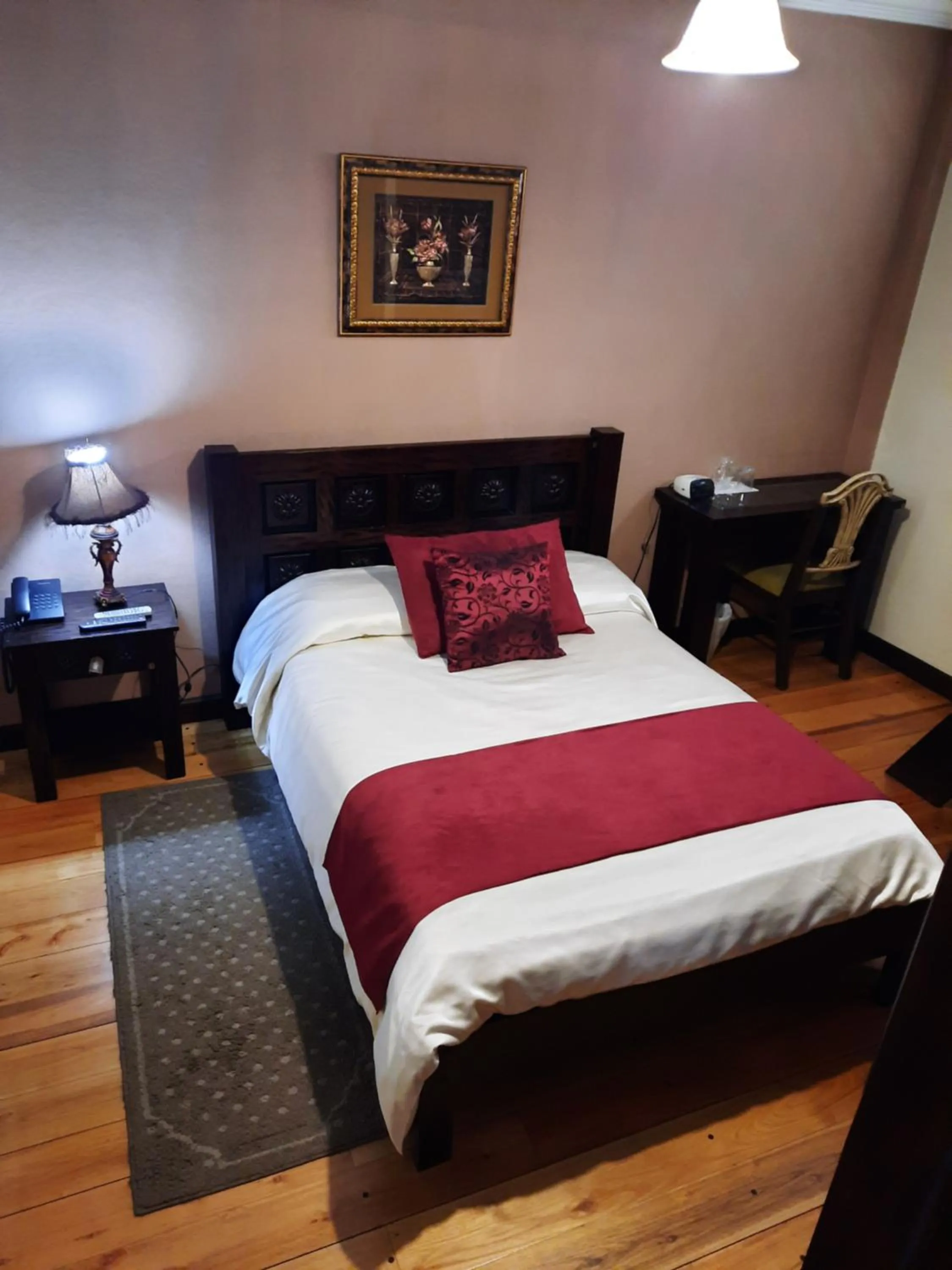 Photo of the whole room, Bed in La Posada Cuencana Hotel