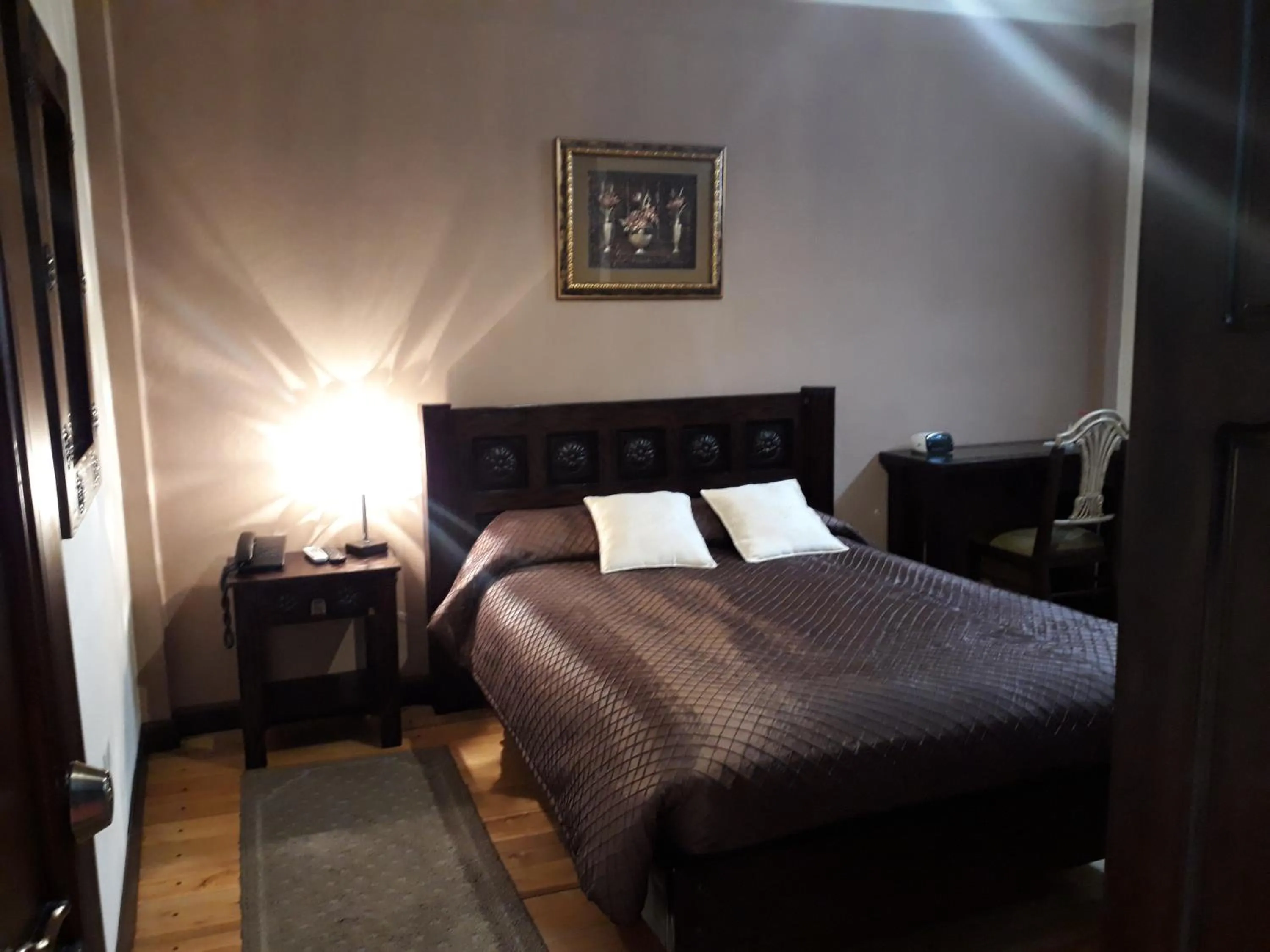 Decorative detail, Bed in La Posada Cuencana Hotel