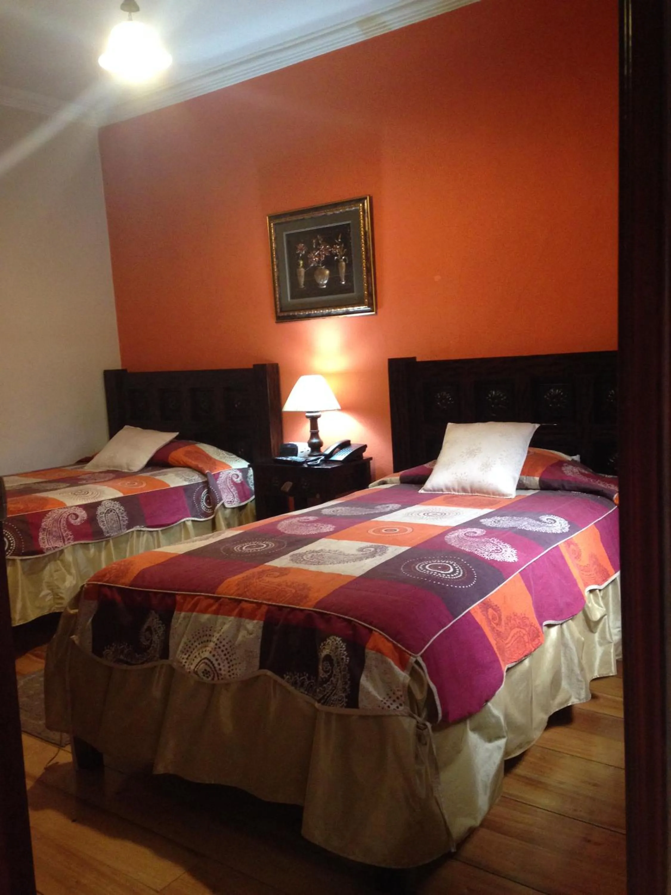 Photo of the whole room, Bed in La Posada Cuencana Hotel