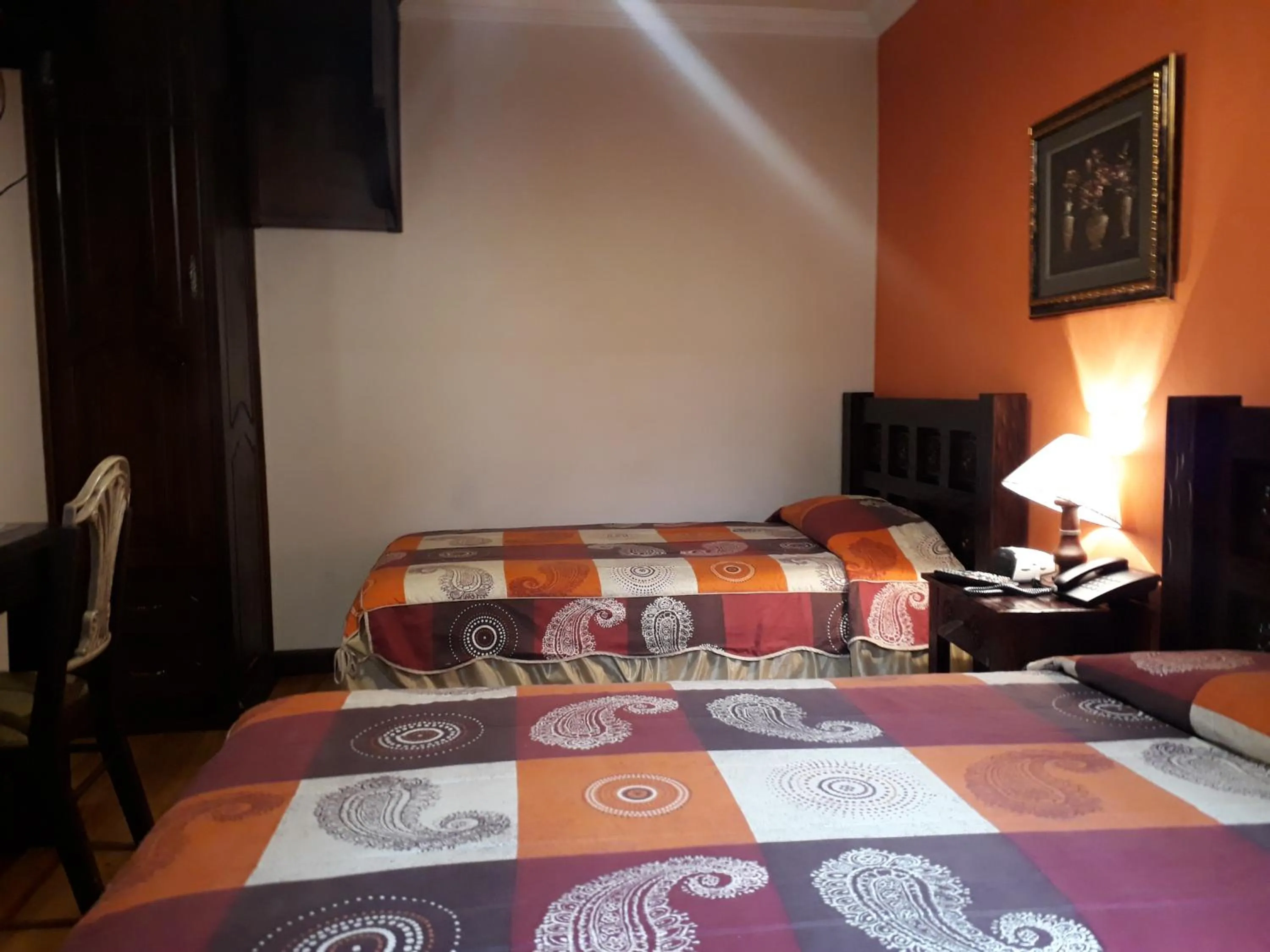 Photo of the whole room, Bed in La Posada Cuencana Hotel