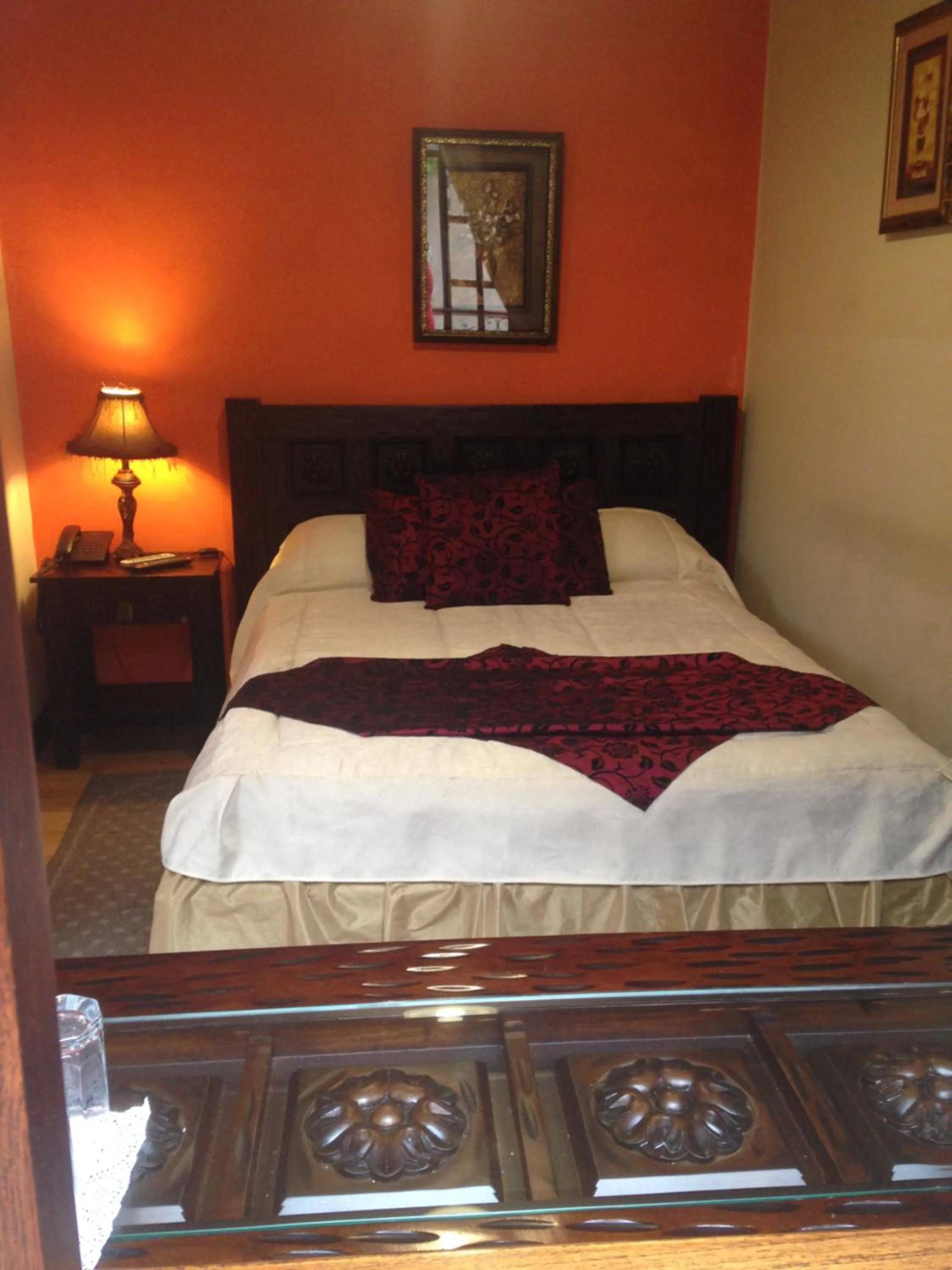 Bed in La Posada Cuencana Hotel