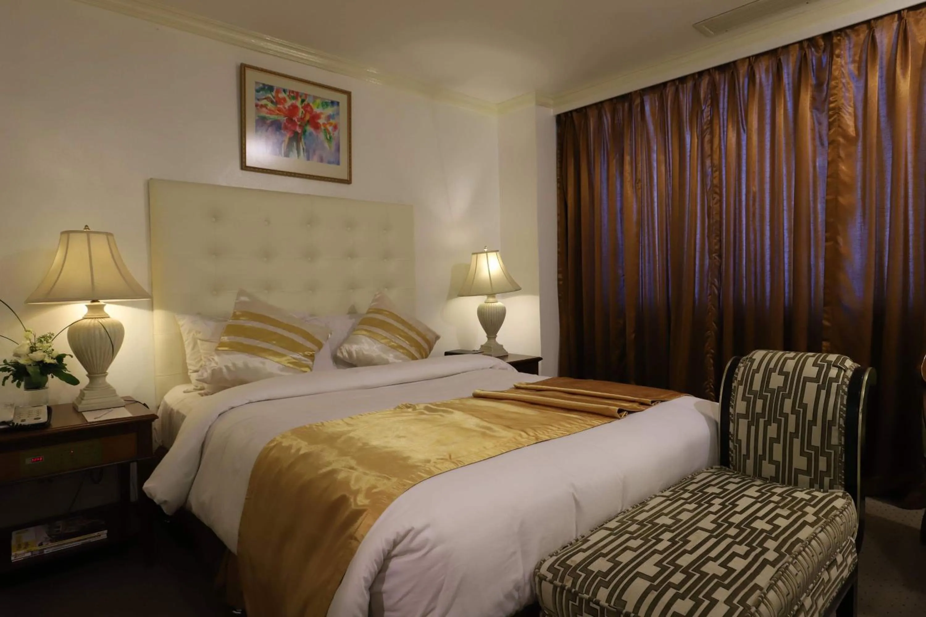 Bed in Tiara Oriental Hotel Makati powered by Cocotel