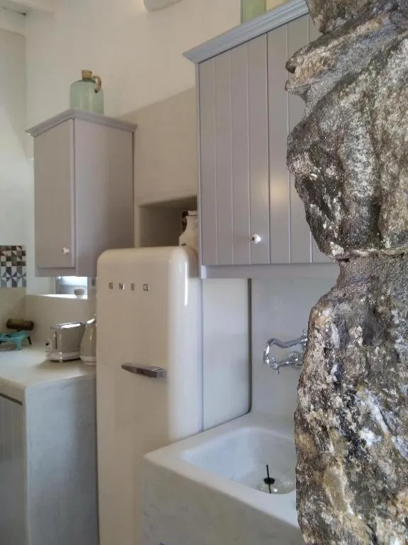 Kitchen or kitchenette in Esperia Luxury Suites