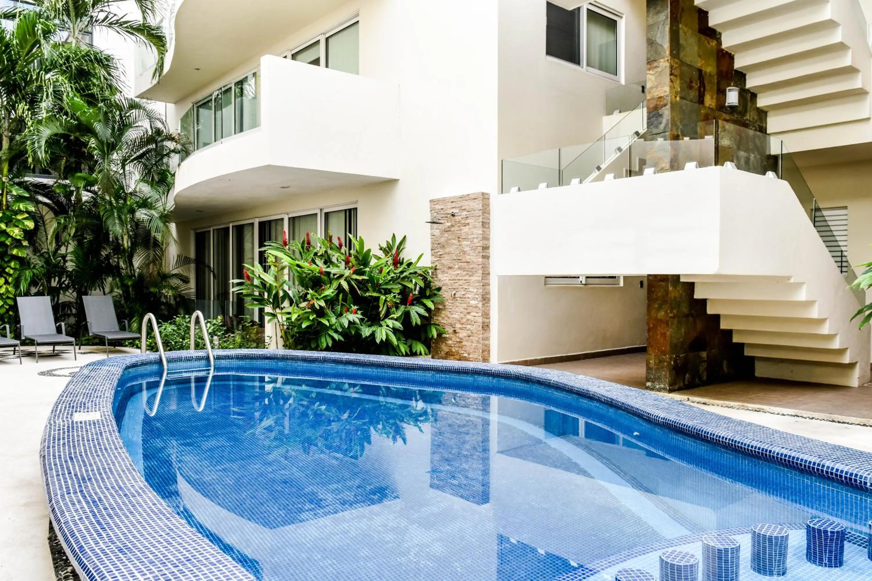 Swimming pool in Mamitas Village by Casago