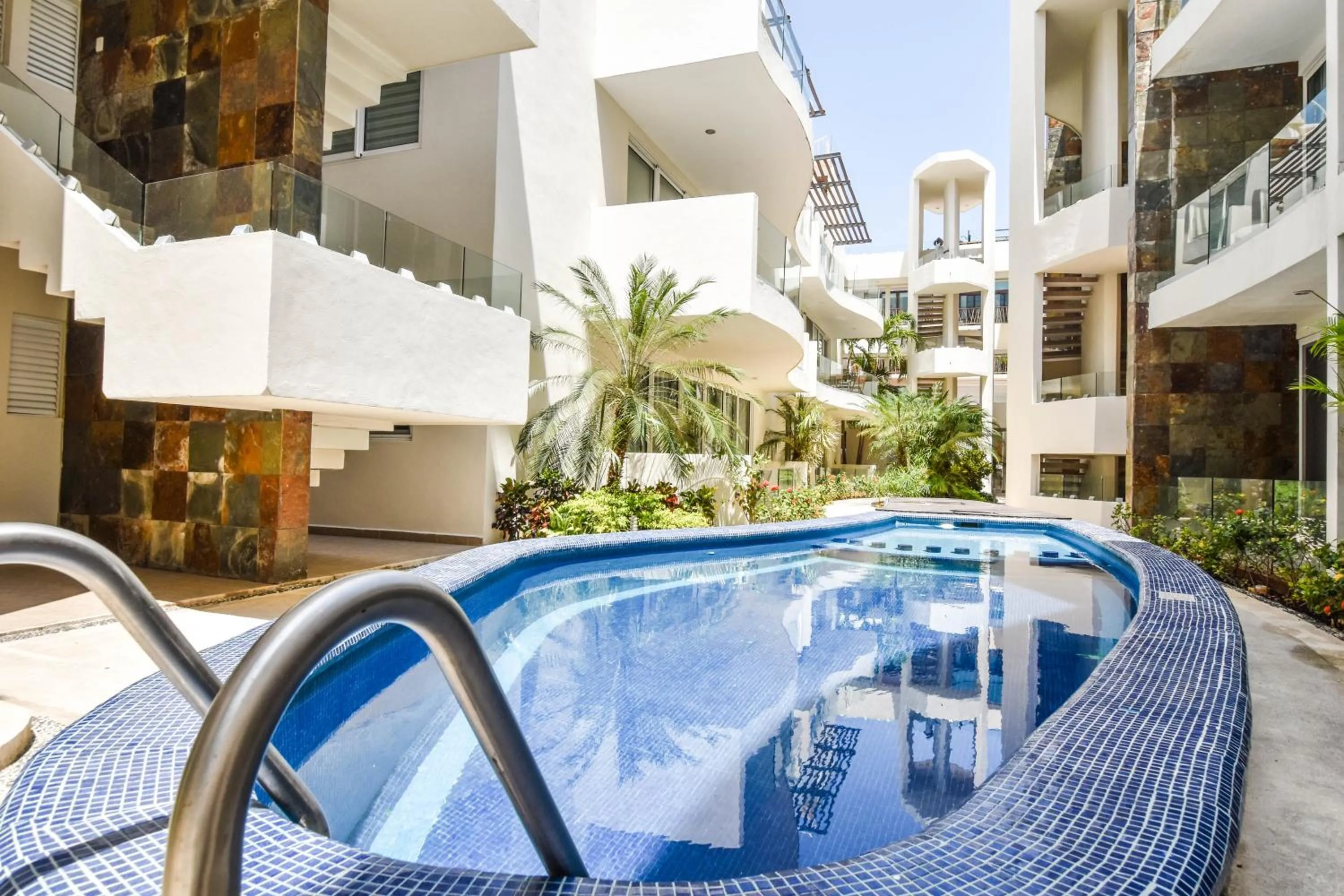 Swimming pool in Mamitas Village by Casago