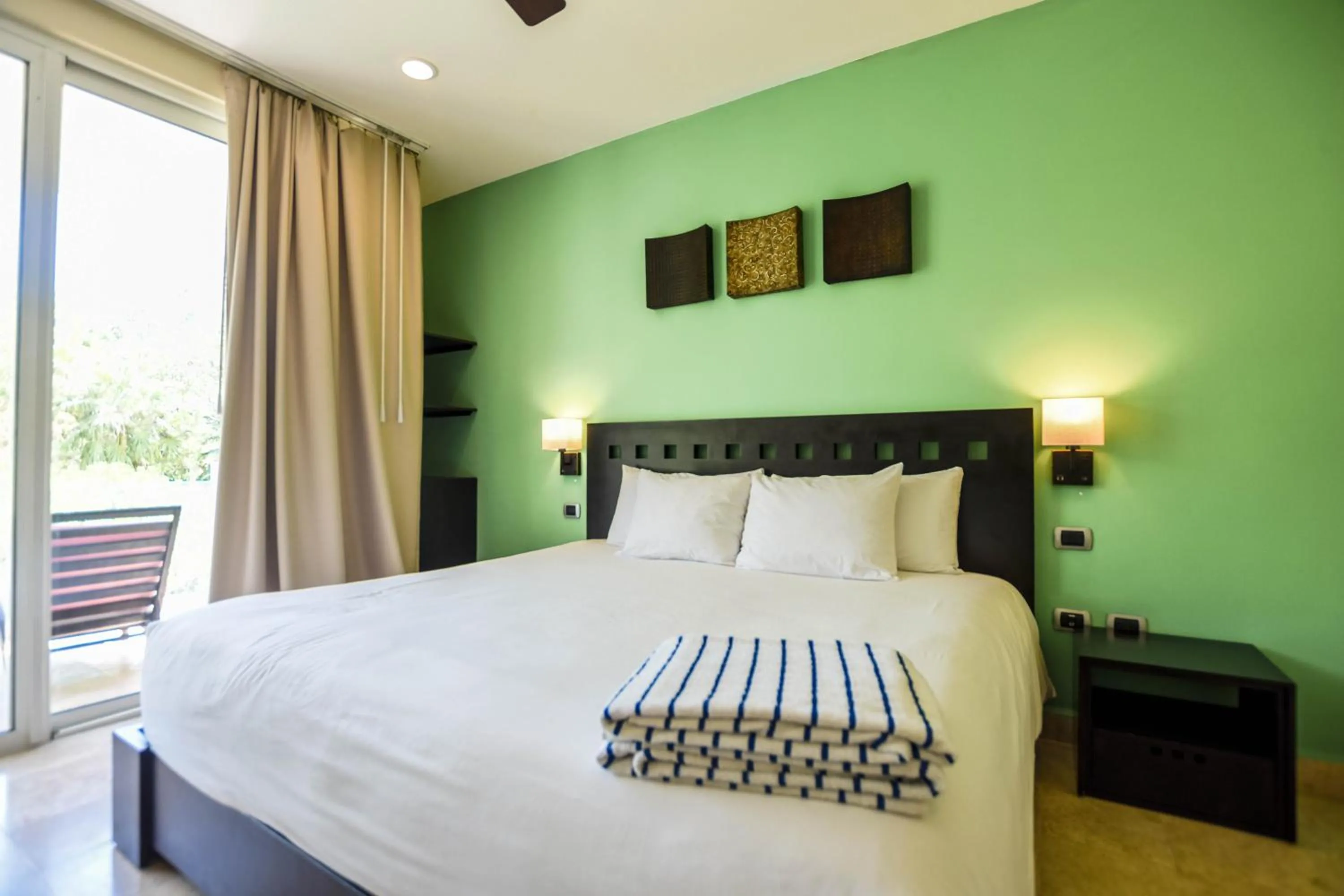Bed in Mamitas Village by Casago