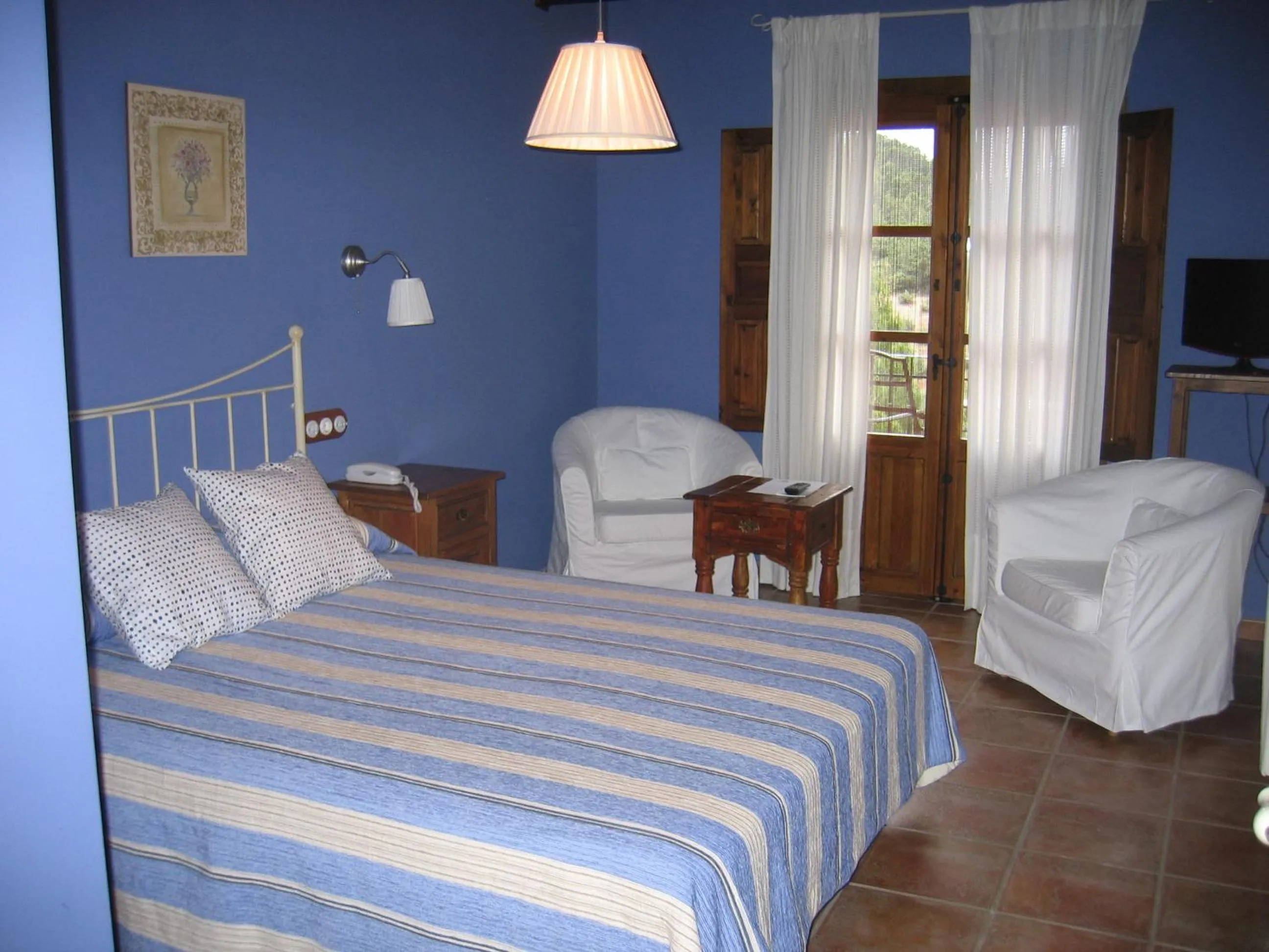 Photo of the whole room, Bed in Hotel de Montaña Cueva Ahumada