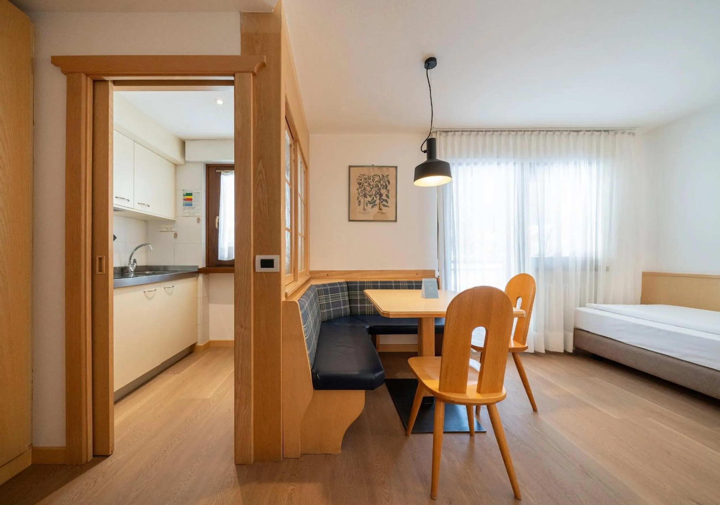 Seating area, Bed in Residence Contrin