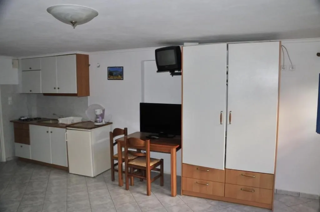 Communal kitchen in Milos Bay Suites