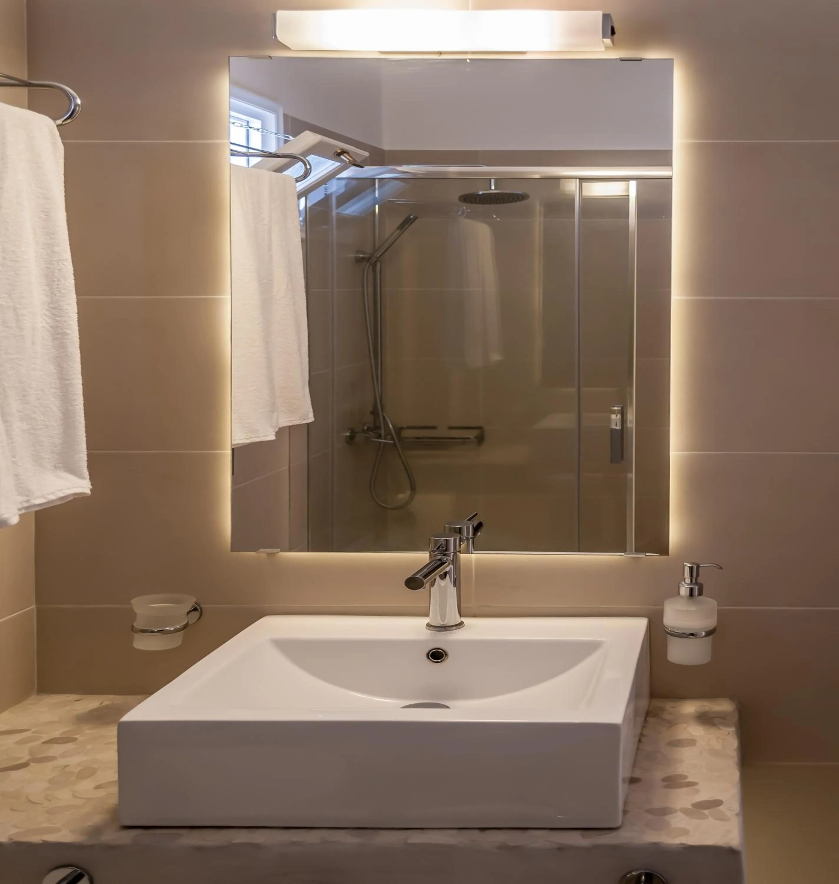 Bathroom in Milos Bay Suites