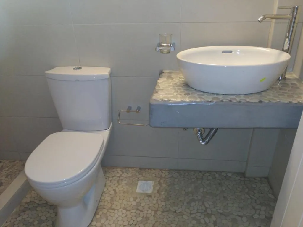 Bathroom in Milos Bay Suites