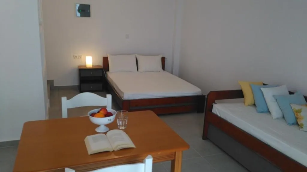 Seating area, Bed in Milos Bay Suites