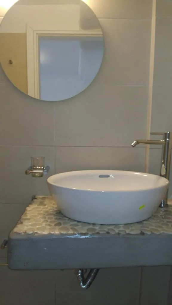 Bathroom in Milos Bay Suites