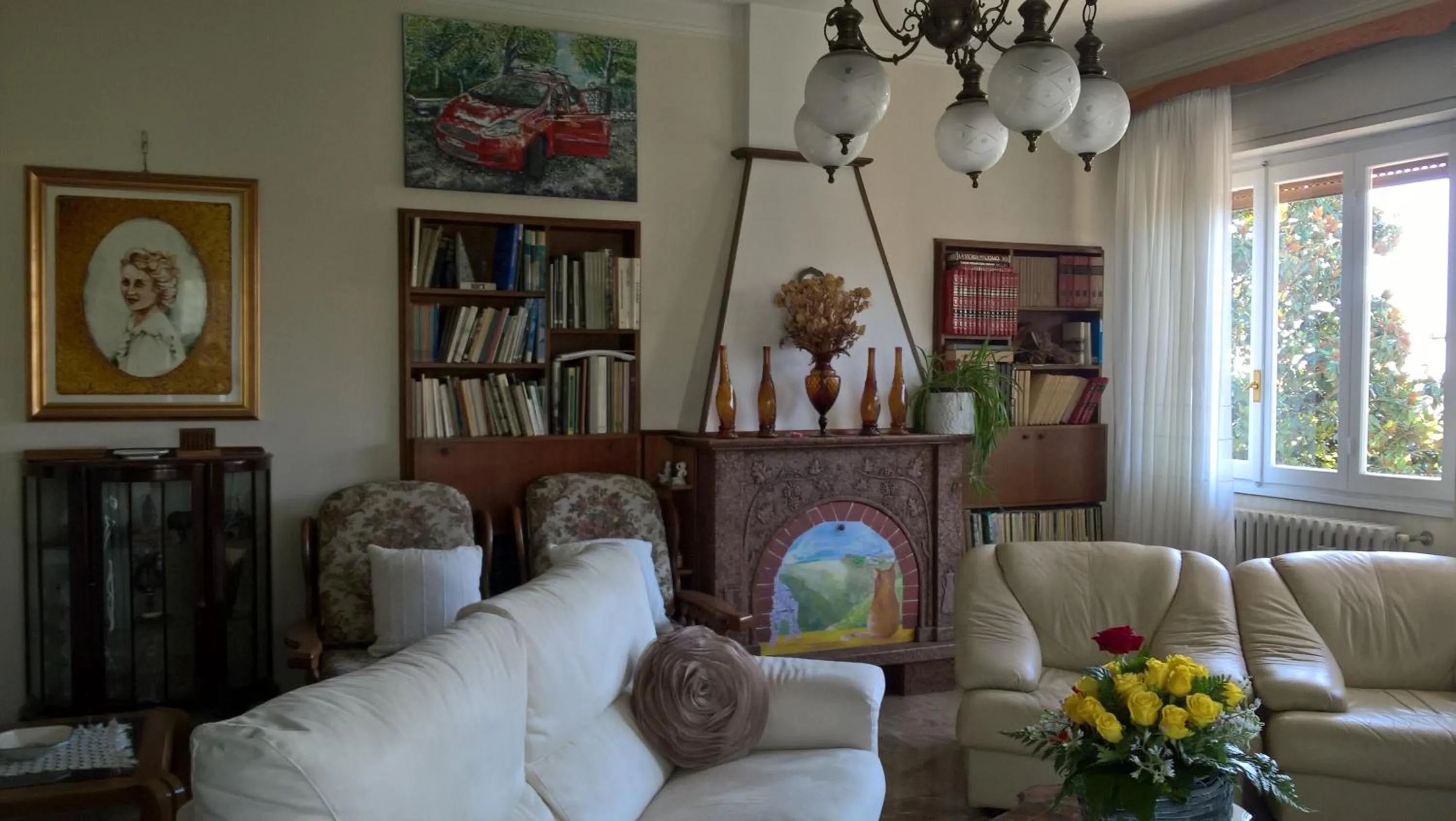 Communal lounge/ TV room in B&B Il Glicine