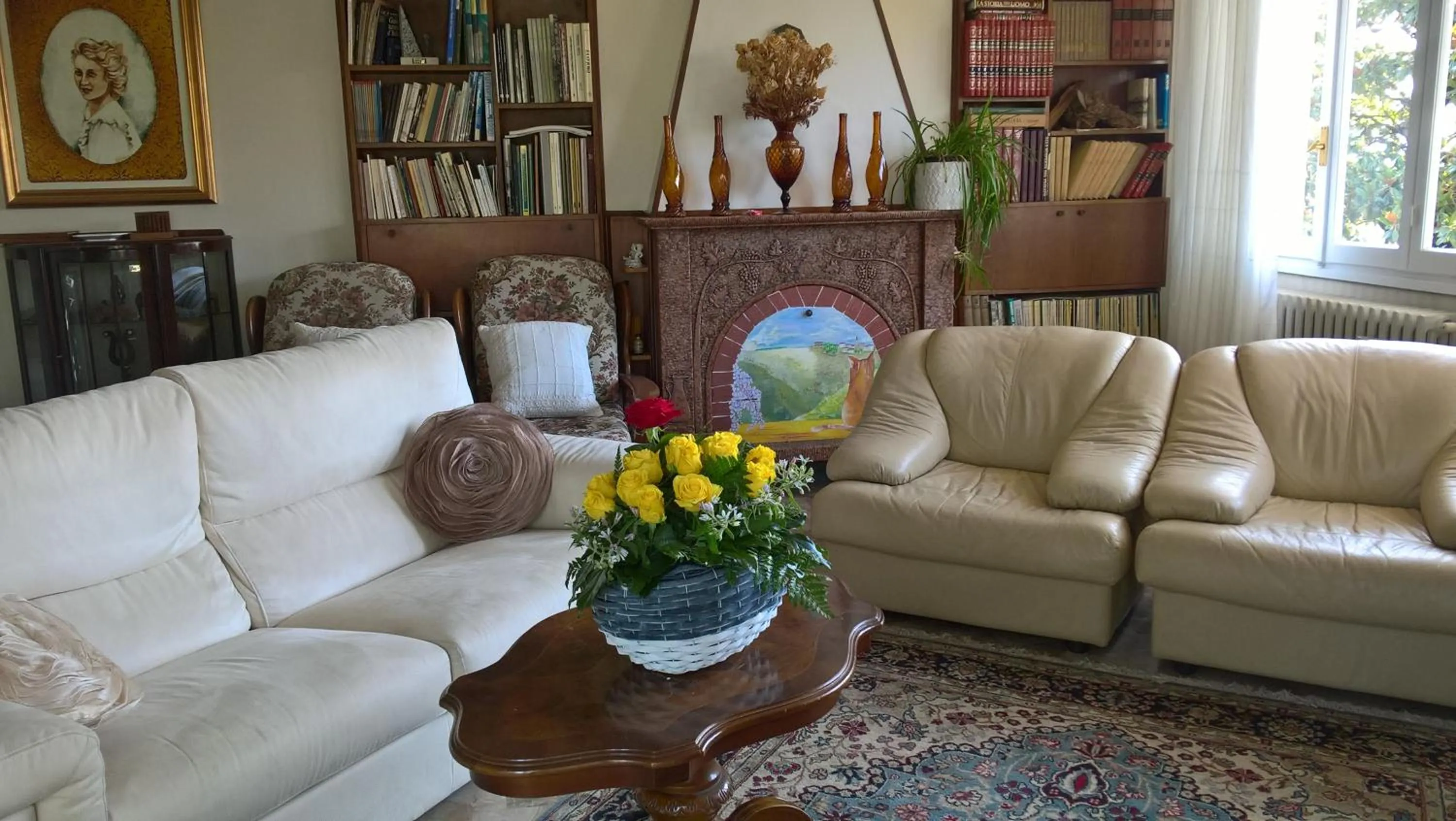 Communal lounge/ TV room in B&B Il Glicine