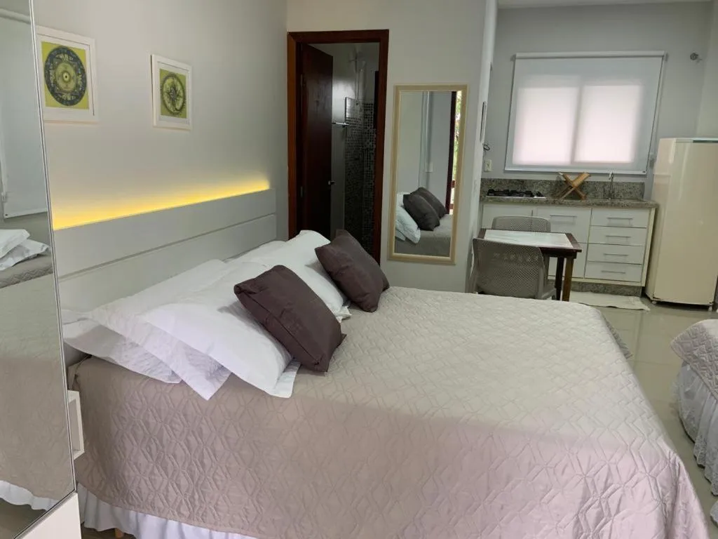 Bed in Pousada Mar de Cristal