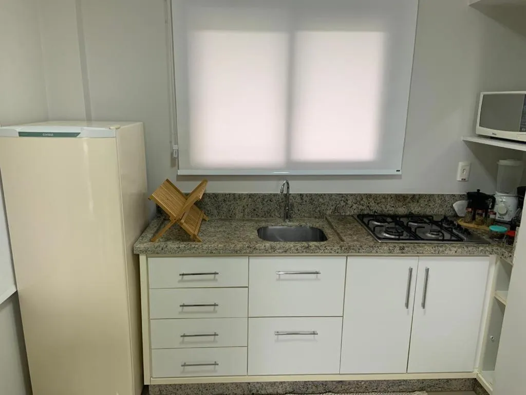 Kitchen or kitchenette in Pousada Mar de Cristal