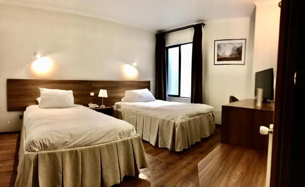 Bed in KU Hotel Turismo Temuco