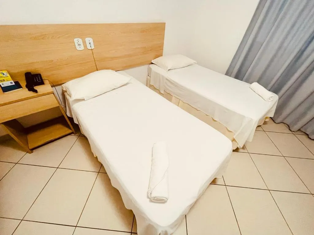 Bed in Pioneiro Hotel