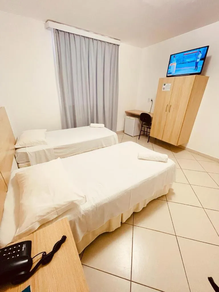 Bed in Pioneiro Hotel