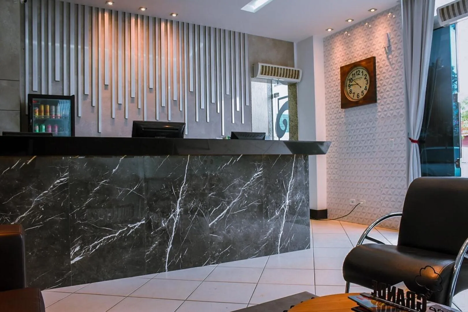 Lobby or reception in Pioneiro Hotel