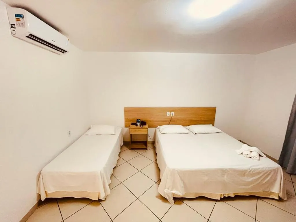 Bed in Pioneiro Hotel