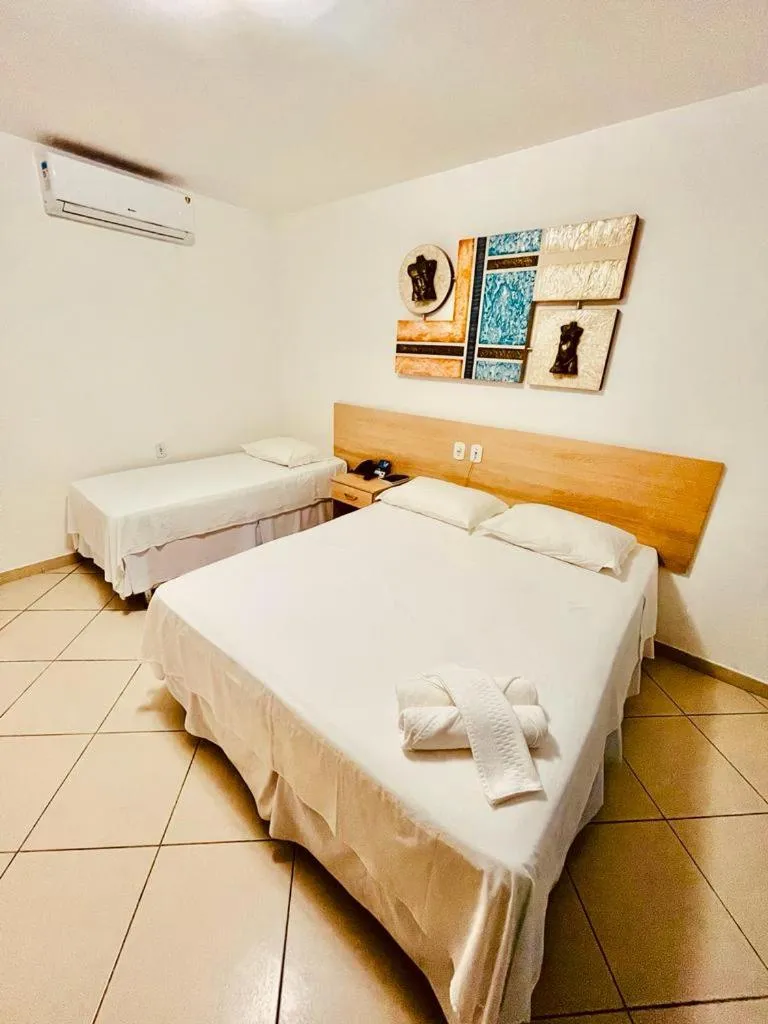 Bed in Pioneiro Hotel