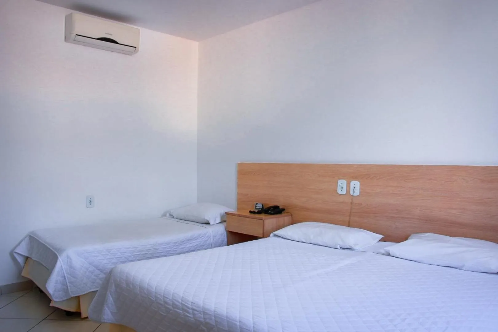 Bed in Pioneiro Hotel