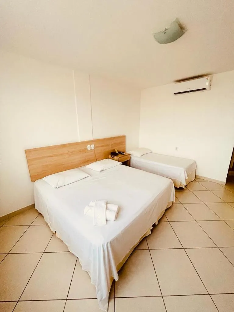 Bed in Pioneiro Hotel