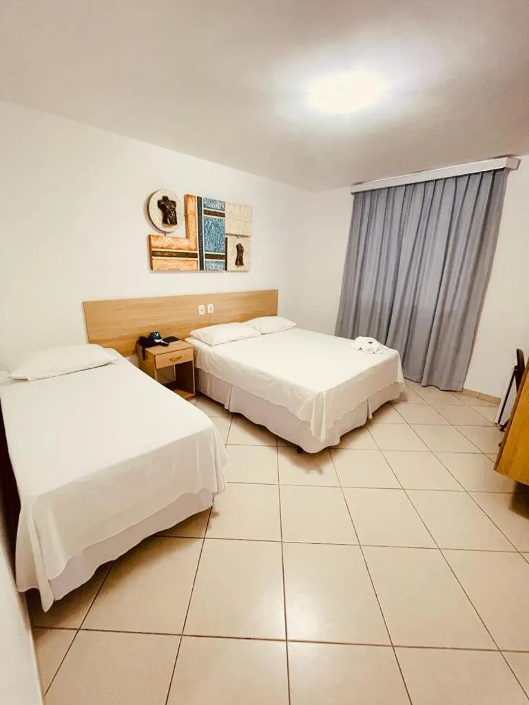 Bed in Pioneiro Hotel